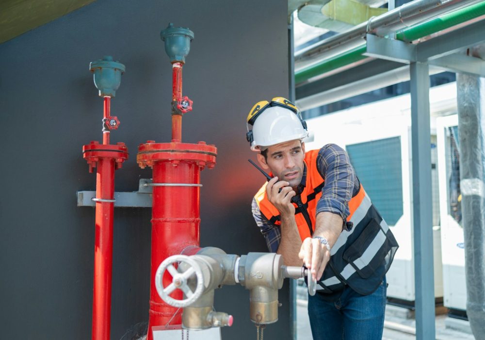 Engineer under checking the industry Fire Protection system
